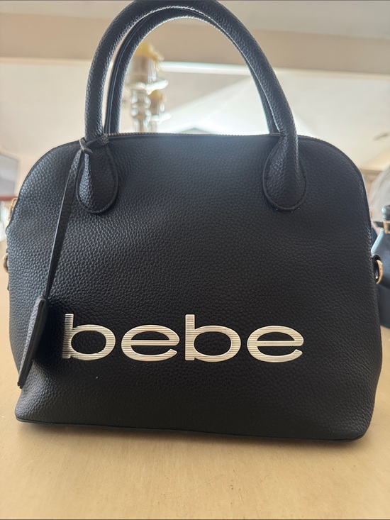 bebe Handbags - bebe Black Pebbled Dome Satchel with Silver Logo